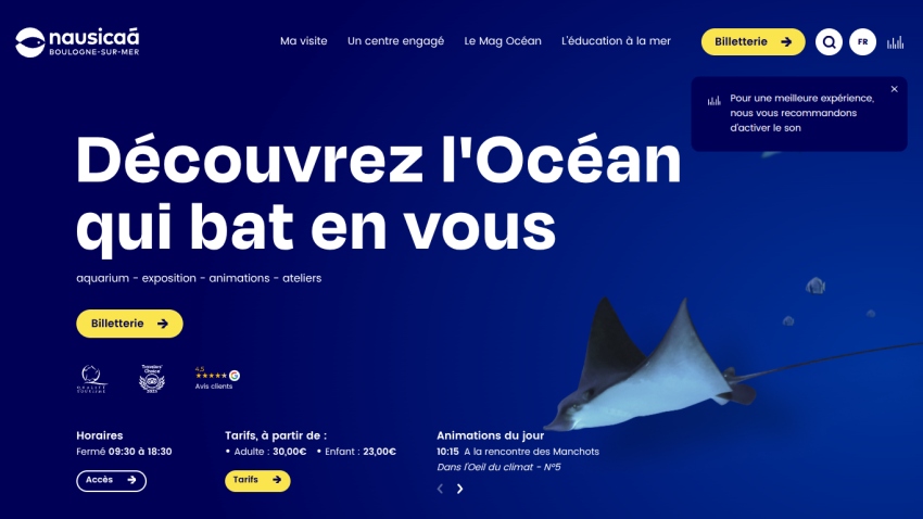 Homepage hero section with headline about ocean exploration and a shark fin image, navigation menu, and call-to-action button
