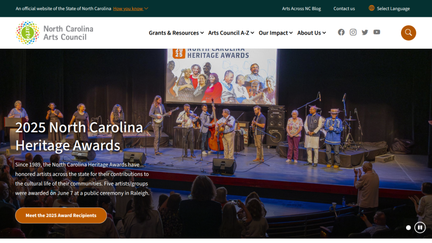 North Carolina Arts Council homepage featuring 2025 Heritage Awards announcement with event photo and navigation menu