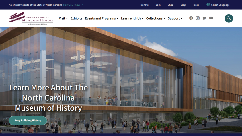 North Carolina Museum of History website with navigation and a large glass building image inviting to learn more