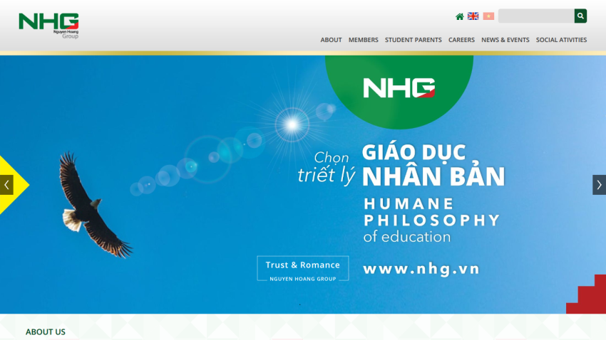 NHG education website with a blue sky background, eagle image, and text about humane philosophy of education