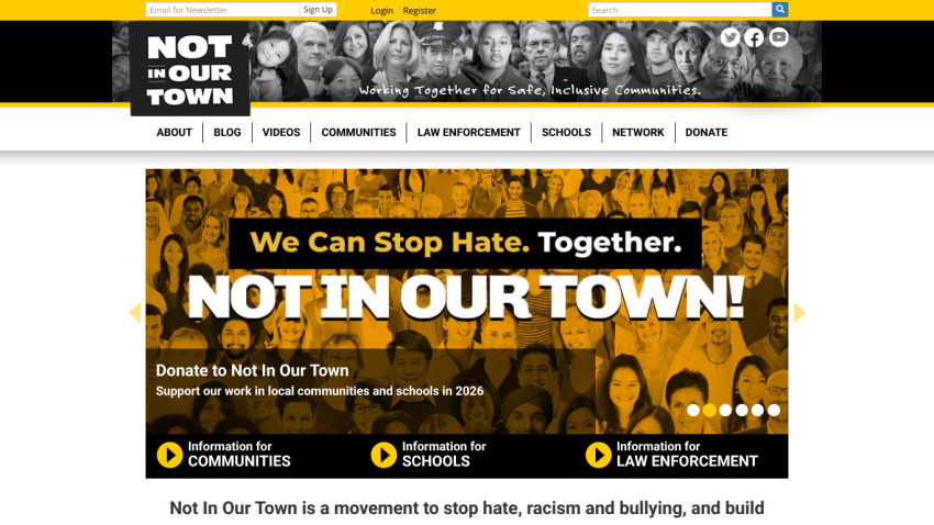 Homepage of Not In Our Town with a call to action against hate and bullying.