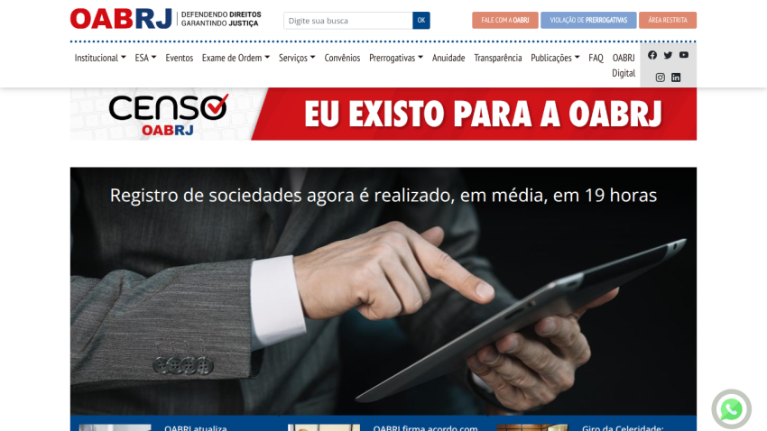 Website header with navigation and a hero section showing a person using a tablet and text about society registration timing
