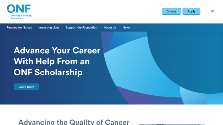 Homepage with navigation bar, large hero image featuring a woman holding a phone, and text about a new app launch