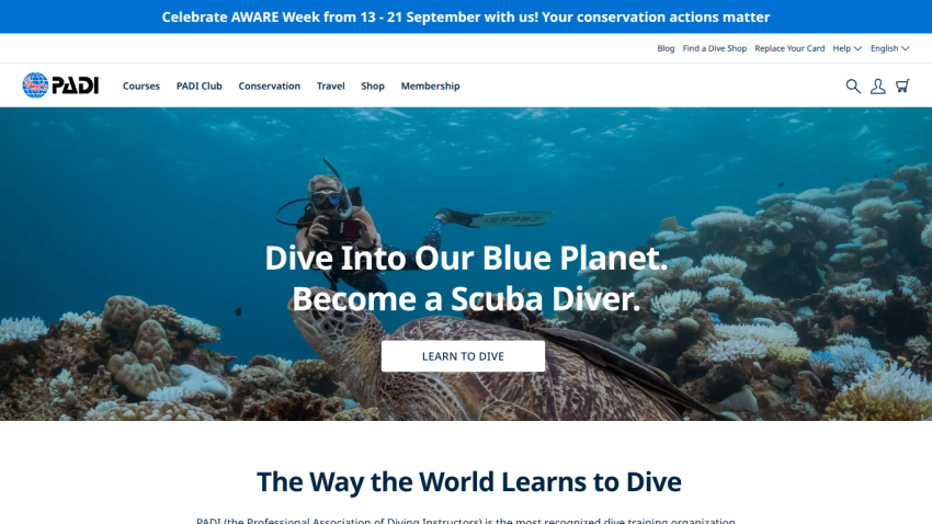 Scuba diving website featuring a diver and coral reef, with a call to action to learn to dive.