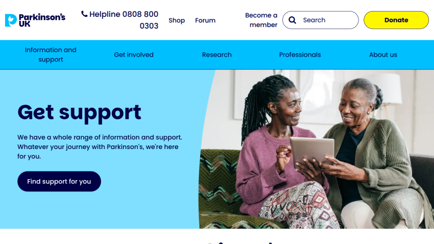 Support section for Parkinson's, featuring two women engaging with a tablet.