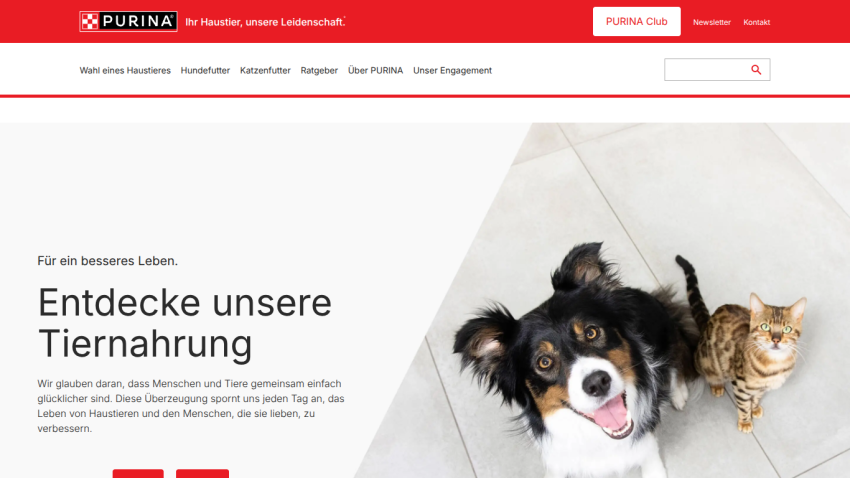 Purina website promoting pet food with a happy dog and cat, headline 'Entdecke unsere Tiernahrung' and navigation menu.