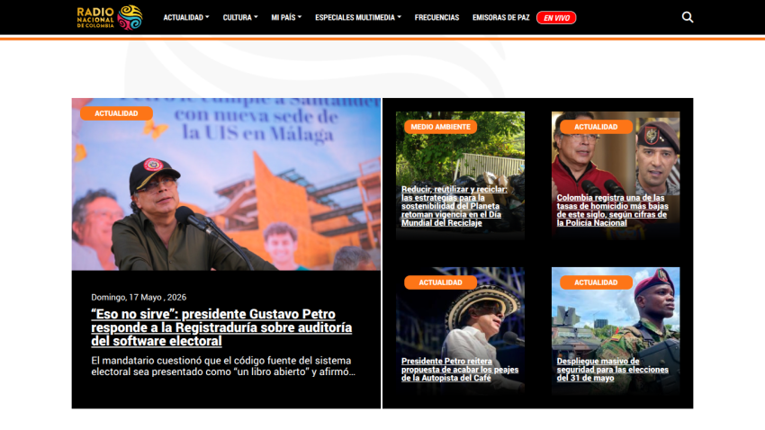 News website featuring a press conference with a speaker and various news articles.