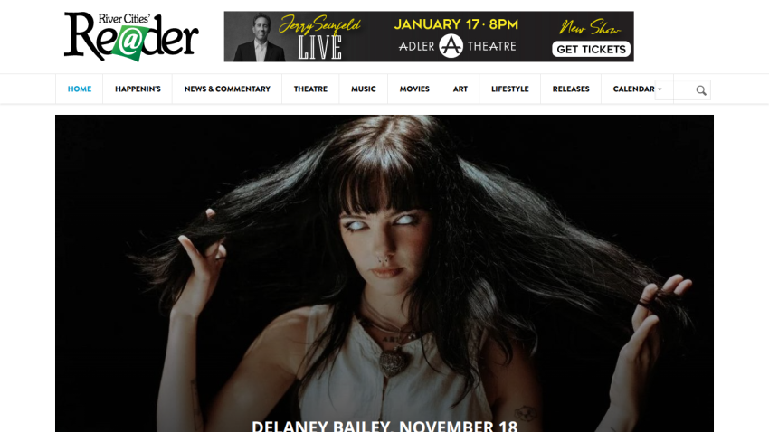 River Cities Reader homepage with navigation menu and a featured article image of a woman with white eyes and dark hair