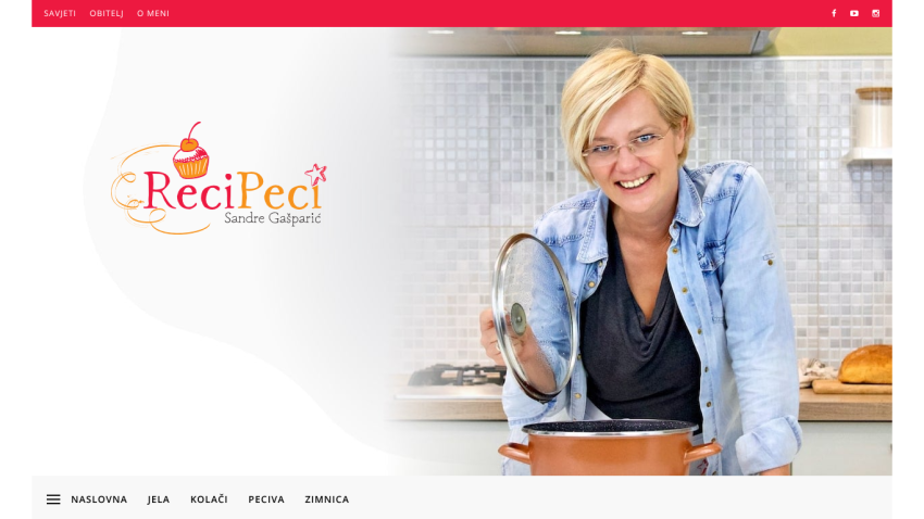 Cooking website homepage with logo, navigation menu, and a smiling woman lifting a pot lid in a kitchen