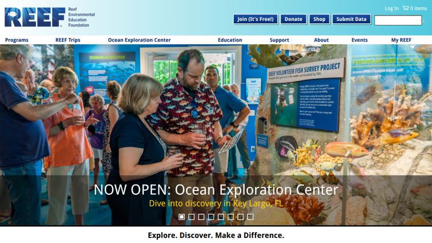 Reef Environmental Education Foundation website promoting the newly opened Ocean Exploration Center in Key Largo, FL with people viewing marine exhibits