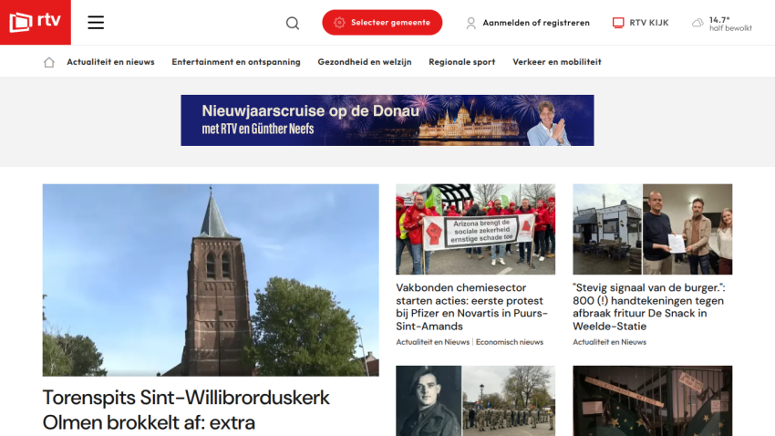 News website homepage with headline about Torenpatsie Sint-Willibrorduskerk Olmen and a large image of a church tower under blue sky