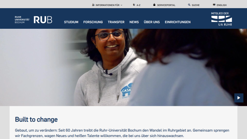 RUB University homepage featuring a smiling woman and the tagline 'Built to change'.