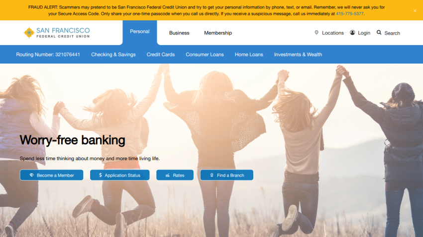 Homepage of a bank promoting worry-free banking with a cheerful group of people.
