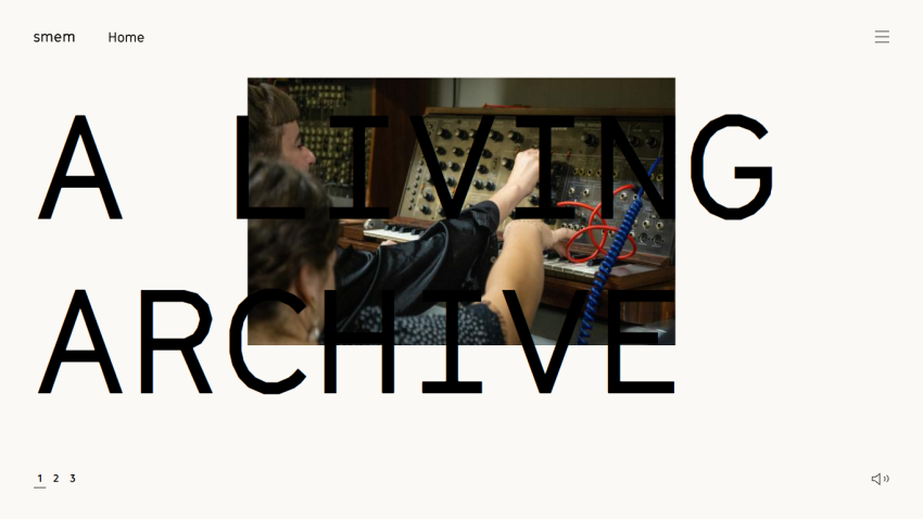 Website header with navigation and a hero section showing two people working on a modular synthesizer with large text 'A LIVING ARCHIVE'