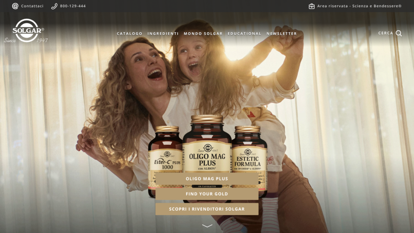 Solgar supplement bottles featured with a joyful mother and child in the background, navigation menu and contact info visible