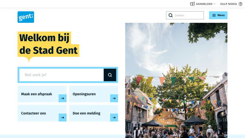 Homepage of Stad Gent with a search bar and vibrant street scene.