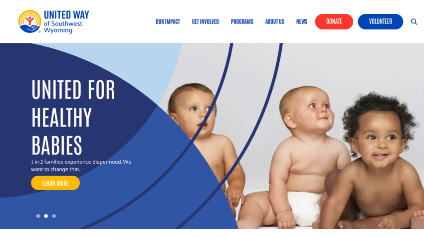 Homepage with navigation bar, large hero image of a mountain landscape, headline 'Explore the World', and a call-to-action button