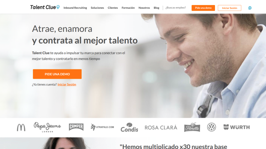 Talent Clue homepage with headline about attracting and hiring top talent, demo button, and client logos