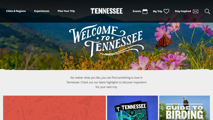 Homepage of Tennessee tourism site featuring welcome message and scenic background.