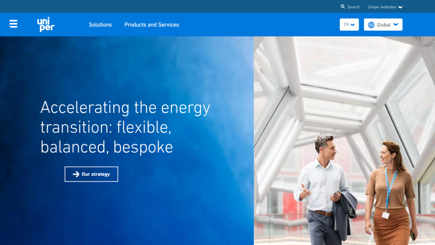 Homepage featuring a tagline about energy transition and two people walking in a modern setting.