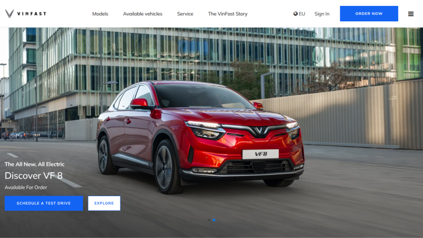Electric car VF 8 showcased with options to schedule a test drive or explore on VinFast website
