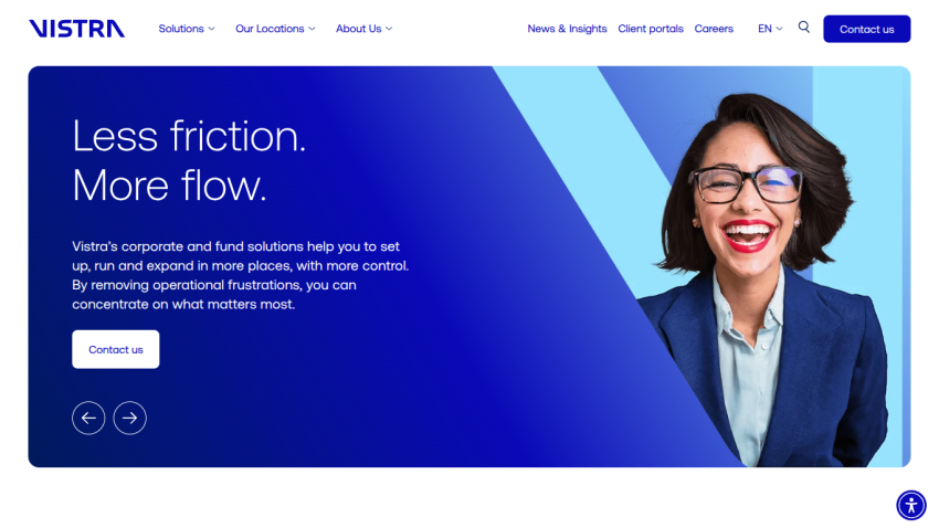 Vistra's homepage featuring a woman smiling with the text 'Less friction. More flow.'