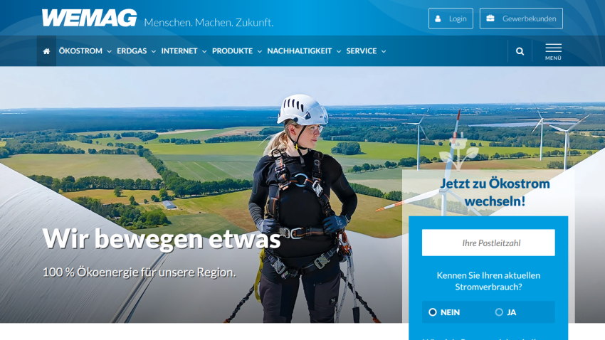 WEMAG website promoting 100% eco energy with a wind turbine technician and a form to switch to green electricity