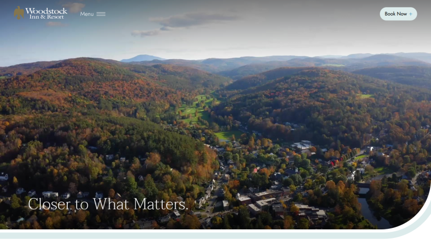 Woodstock Inn & Resort website with aerial view of a valley and the text 'Closer to What Matters.'