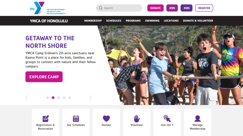 YMCA of Honolulu homepage with navigation, camp promotion, and options for registration, schedules, donation, volunteering, and membership