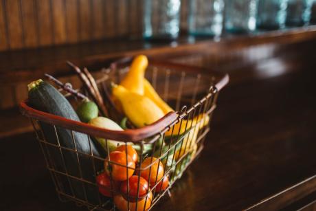 Check-out trolley basket in a physical vegetable store 