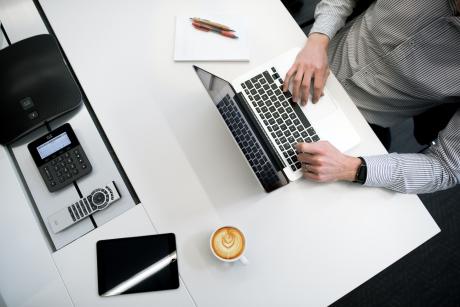 a person working in laptop