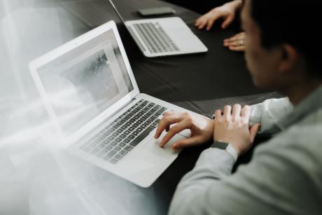 a person working in laptop