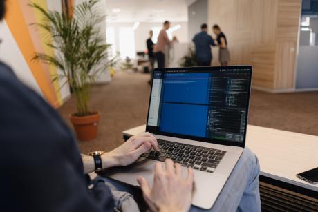 a person working in laptop