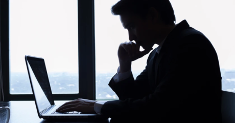 man staring at the laptop