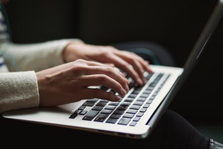 a person working in laptop