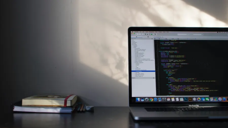 Laptop and books