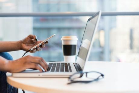 a woman working on laptop