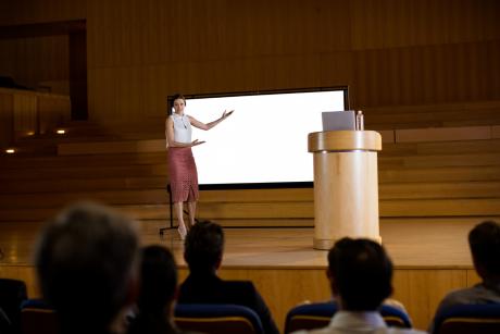 female business executive giving presentation
