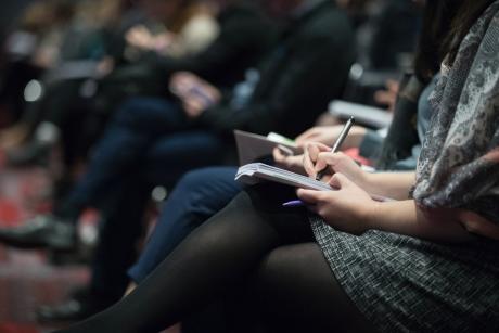 people taking notes during a session