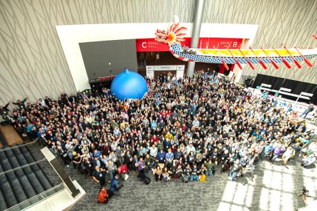 Attendees gather at DrupalCon Portland 2024 for the group photo