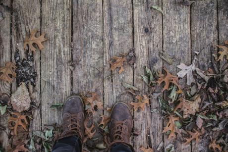 Man standing on a wooden deck
