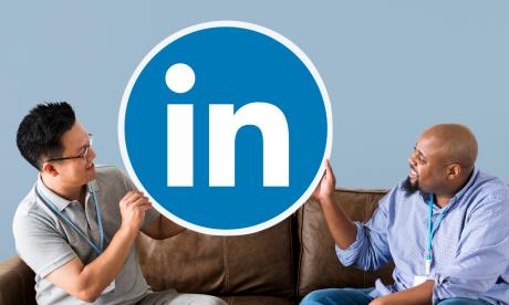 People holding a Linkedin logo