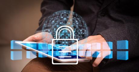 A man browsing internet and a security lock logo