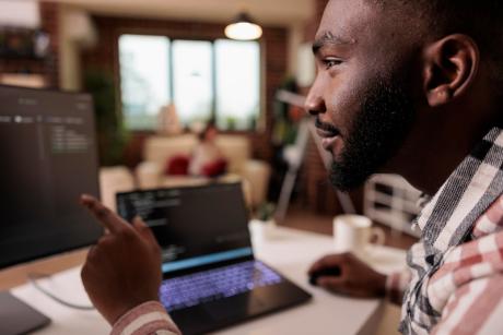 African american it engineer programming binary code interface
