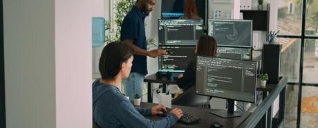 Developer writing coder on computer