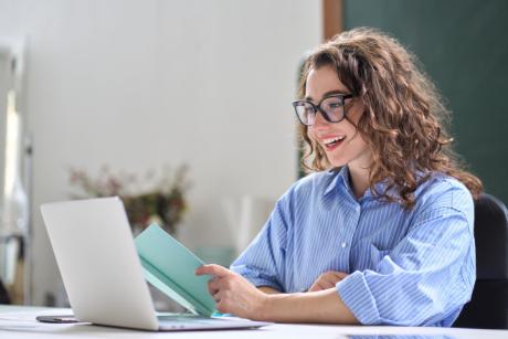 woman looking at paper