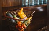Check-out trolley basket in a physical vegetable store 