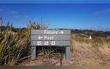 wooden signage saying future and past