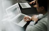 a person working in laptop