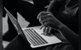 a person working in laptop